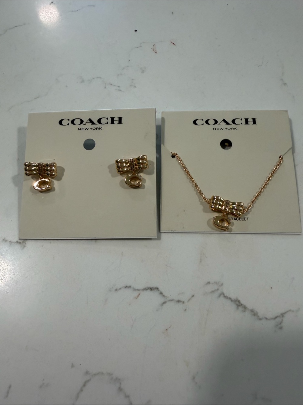 COACH Gold-Tone Signature Charm Bracelet and Earrings Set